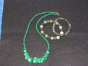 green necklace and jade bracelets