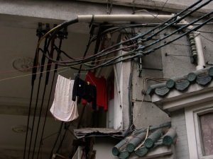 laundry hanging from electrical wiring